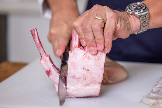 Cutting lamb lollipops for recipe